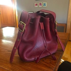 Coach bucket bag with long shoulder strap